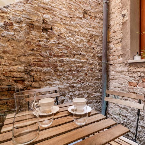 Sip your morning espresso in the private courtyard