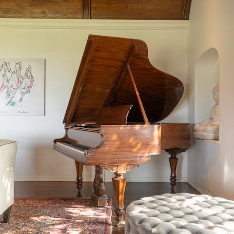 Tickle the ivories at the beautiful grand piano