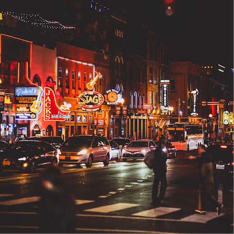Take a twelve-minute taxi to the bars and music venues of Nashville's Broadway