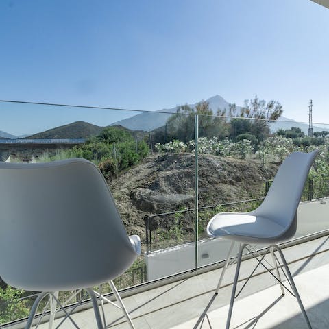Pull up a chair and admire the mountain view from the terrace