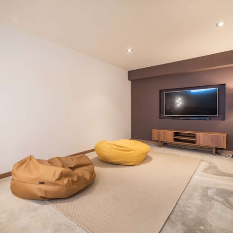 Settle down for a movie night in the basement TV room