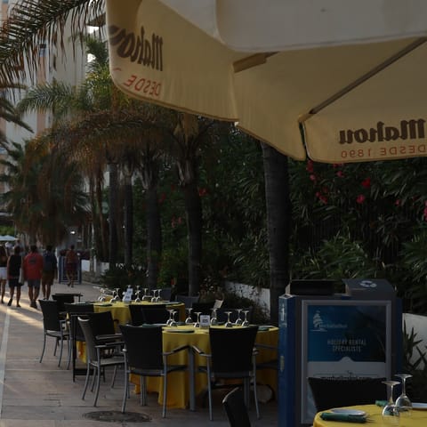 Grab dinner along Marbella's promenade, just moments away