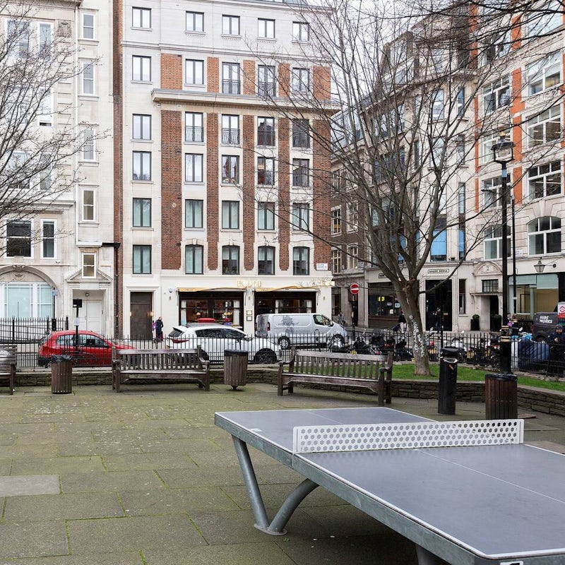 Play table tennis down in the square
