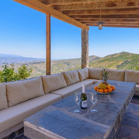 Settle down in the shade of your pergola to enjoy a good book and a glass of wine