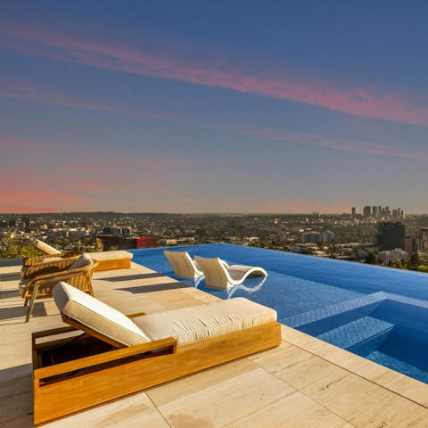 Enjoy incredible views while relaxing by the private pool