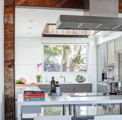 Cook a delicious meal in the sleek German kitchen