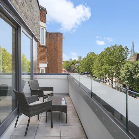 Enjoy a morning coffee on your balcony