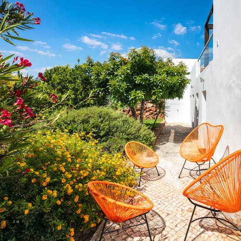 Enjoy the lush greenery of your private garden