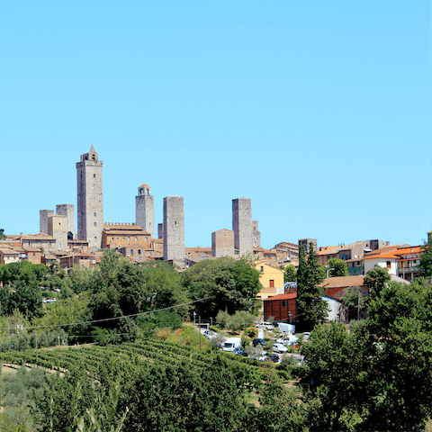 Drive 7.6km to visit the towers of San Gimignano