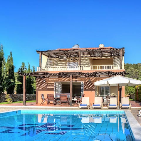 Cool off in the waters of the villa's private pool