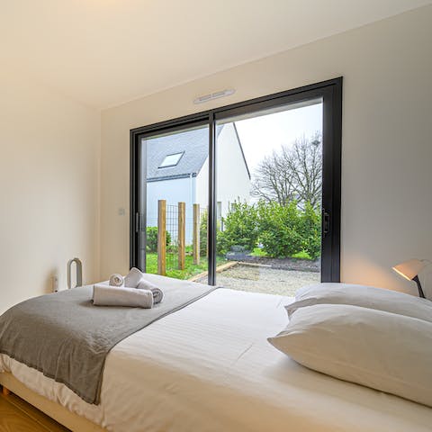 Wake up in the morning to sunlight through your window and a view of the lush green garden