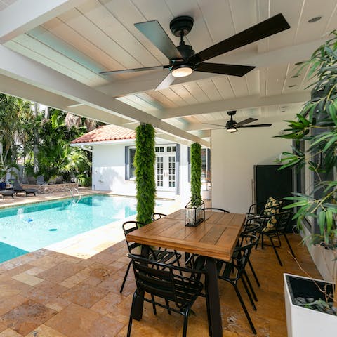 Grill up an American-style feast at the poolside dining area