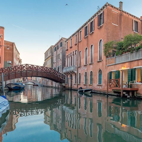 Discover the famous water canals and Gothic palaces of Venice