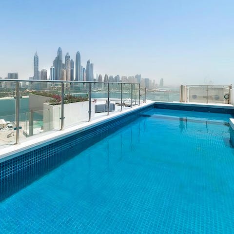 Cool off from the Dubai sun in the private swimming pool 