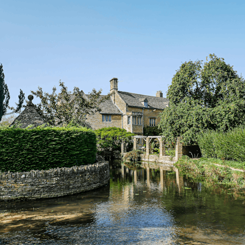 Take a day trip to the Cotswolds, Bourton-on-the-Water is twenty-five miles away