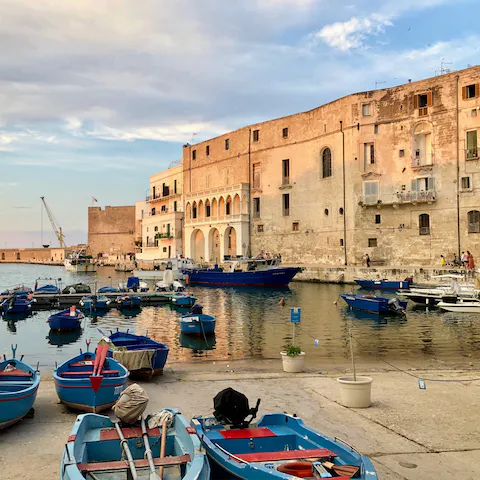 Drive into Monopoli and explore the old town with its harbour and rich history