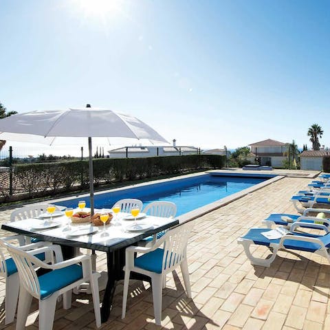 Savour a sunny breakfast by the pool