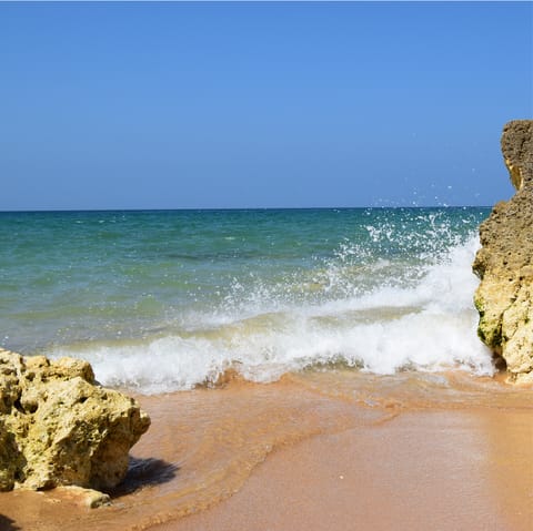 Visit the stunning 2km stretch of Gale beach, a mere twenty-minute walk from your villa