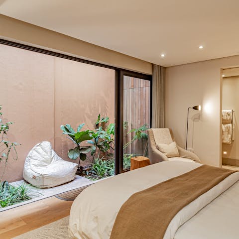 Secret yourself away in the third bedroom with its miniature plant-filled courtyard