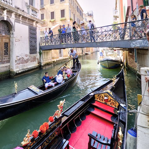 Take a gondola straight from the building's water door onto the canal