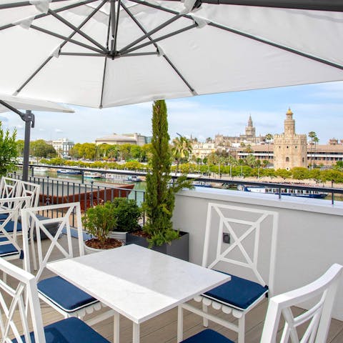 Sip a tinto de verano on the shared roof terrace