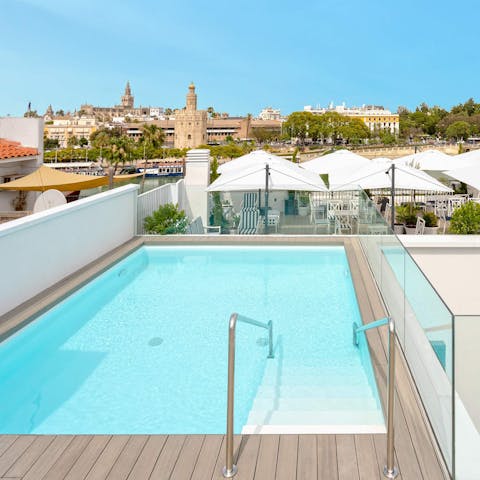 Go for a sunset dip in the pool and admire the view of the Torre del Oro