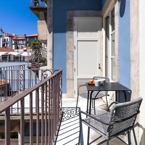 Relax on the sunny balcony with a glass of Port