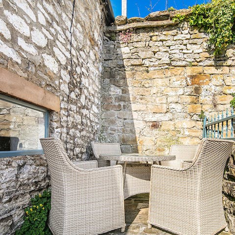 Savour morning coffees and sunshine from the private terrace