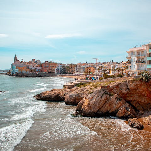 Make the fifteen minute drive to the seaside town of Sitges