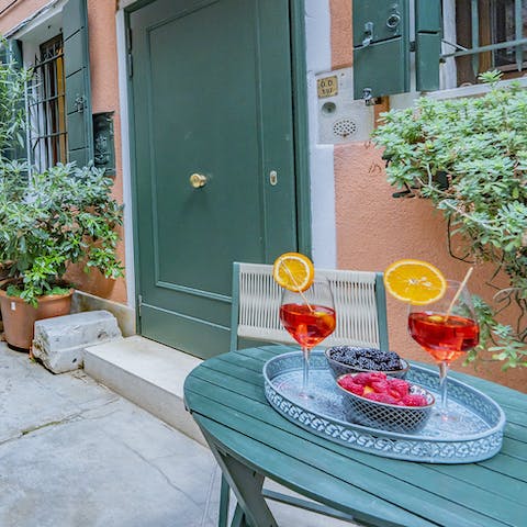 Enjoy Italian cocktails in the shared courtyard