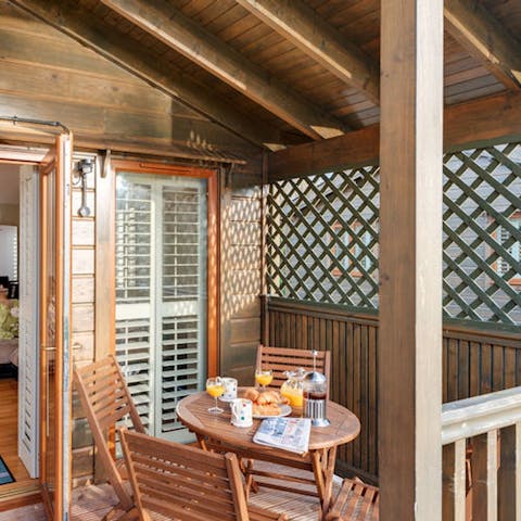 Set up breakfast on the veranda and look out over the lake