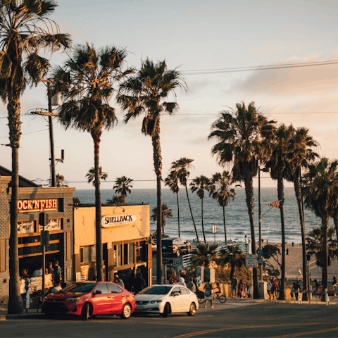 Visit some of the stunning palm tree-lined beaches of Los Angeles and enjoy a beer in a beach bar