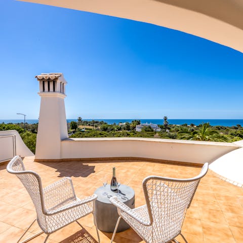 Slip away for a moment and admire the sea views from the sun-soaked terrace