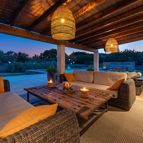 Watch the sunset from the patio with a glass of wine
