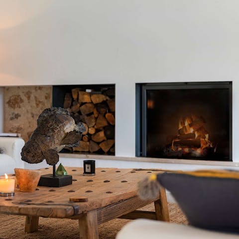 Spend cosy nights in front of the fireplace