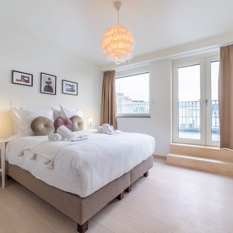 Watch the world go by from the small balcony off the bedroom