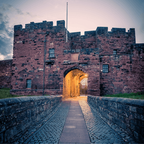 Visit  the medieval Carlisle Castle, a twenty-minute drive away