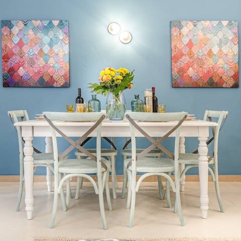 Play card games in the brightly coloured living space