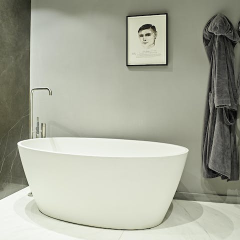 Ramp up your relaxation with a soak in the freestanding tub