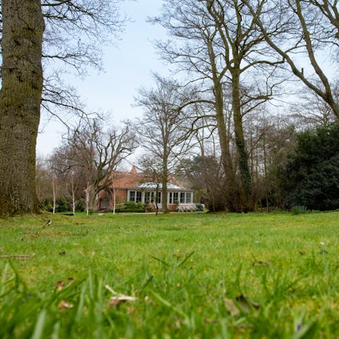 Walk the acre of tree-lined grounds on a sunny day, listening to the babble of the brook