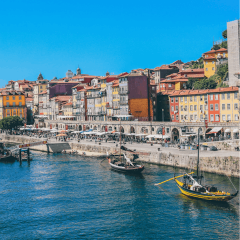 Take your pick from the restaurants and bars lining the riverside promenade at Cais da Ribeira, a ten-minute stroll away