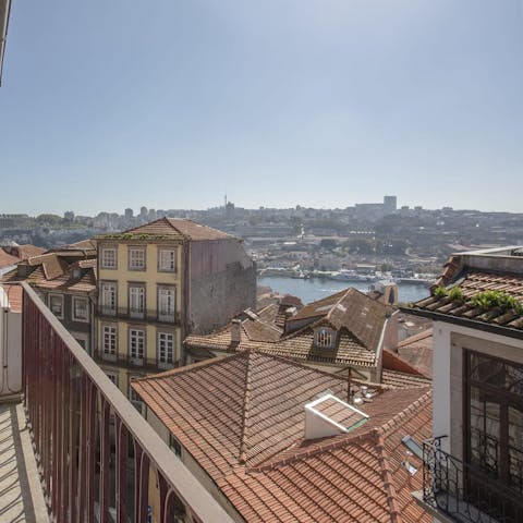 Gaze out over Porto's historic centre from your private balcony