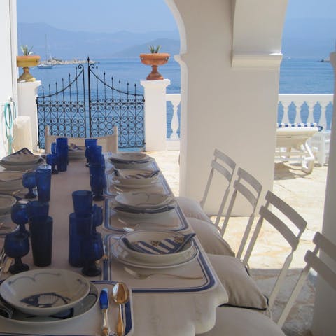 Celebrate in traditional Greek style with beautiful fresh food, sea views and wonderful conversation