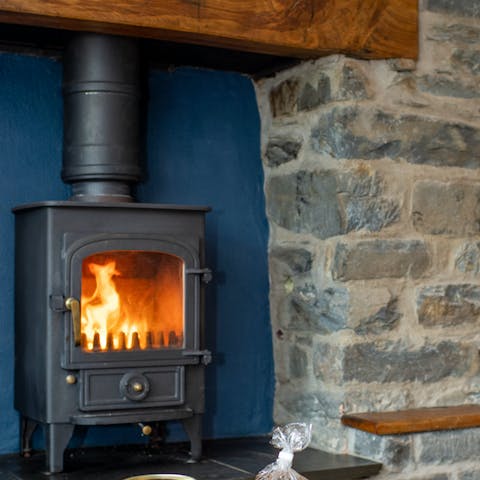 Curl up around the log burner after hiking in the countryside