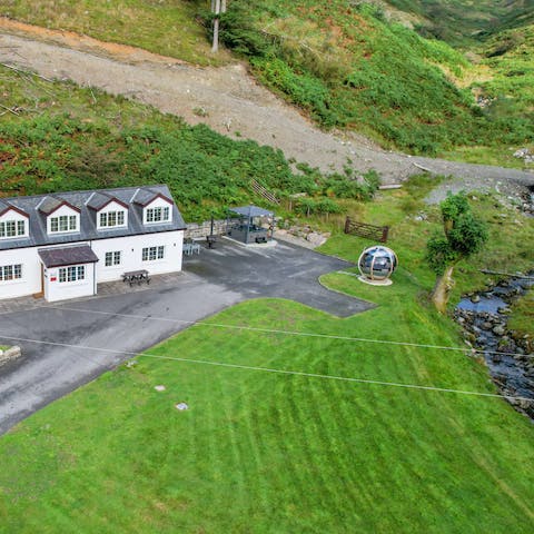 Let the kids tire themselves out playing on the lawn and in the stream