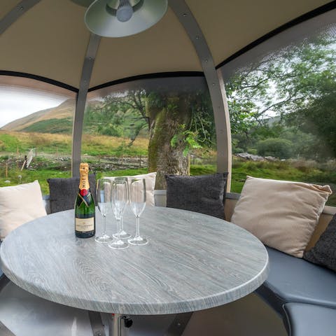 Take in the panoramic countryside views from the rotating garden pod