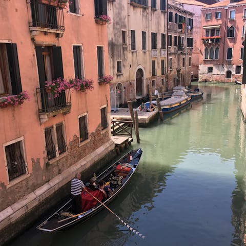 Enjoy canal views from the living room, placing you in the heart of Venice