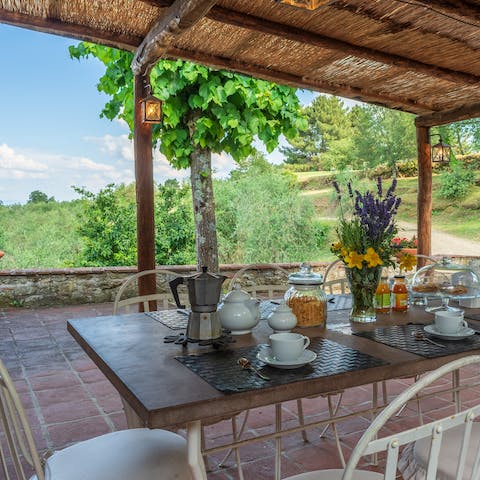 Enjoy breakfast, lunch, and dinner around the outdoor dining table with unbeatable views