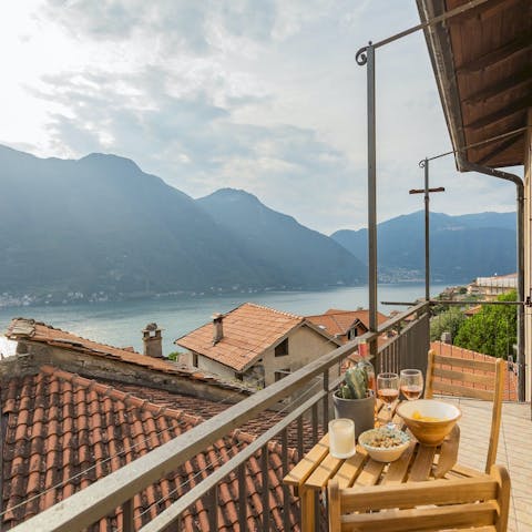 Enjoy a glass of wine on the balcony, while admiring views over Lake Como