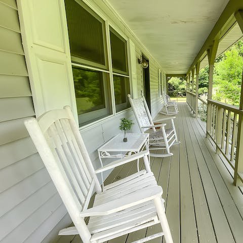 Rock on the wraparound porch as you soak up the greenery around you
